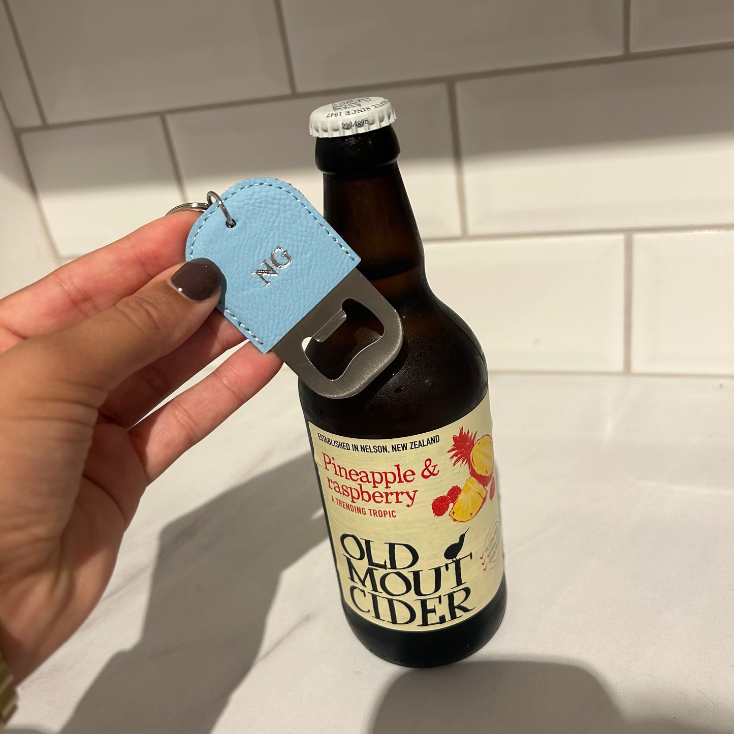 blue vegan leather bottle opener personalised with silver initials