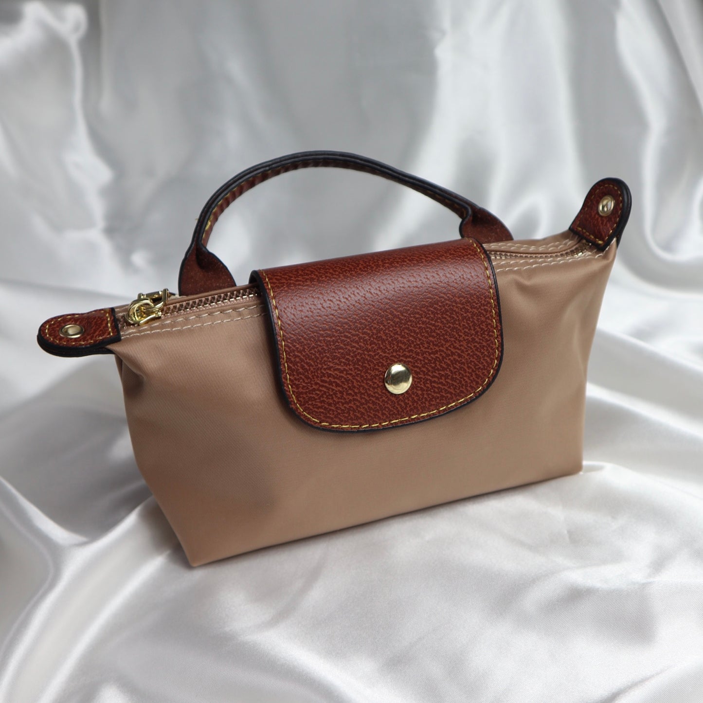 personalised nylon crossbody bag in brown which can be customised with initials in gold or silver. comes with adjustable strap